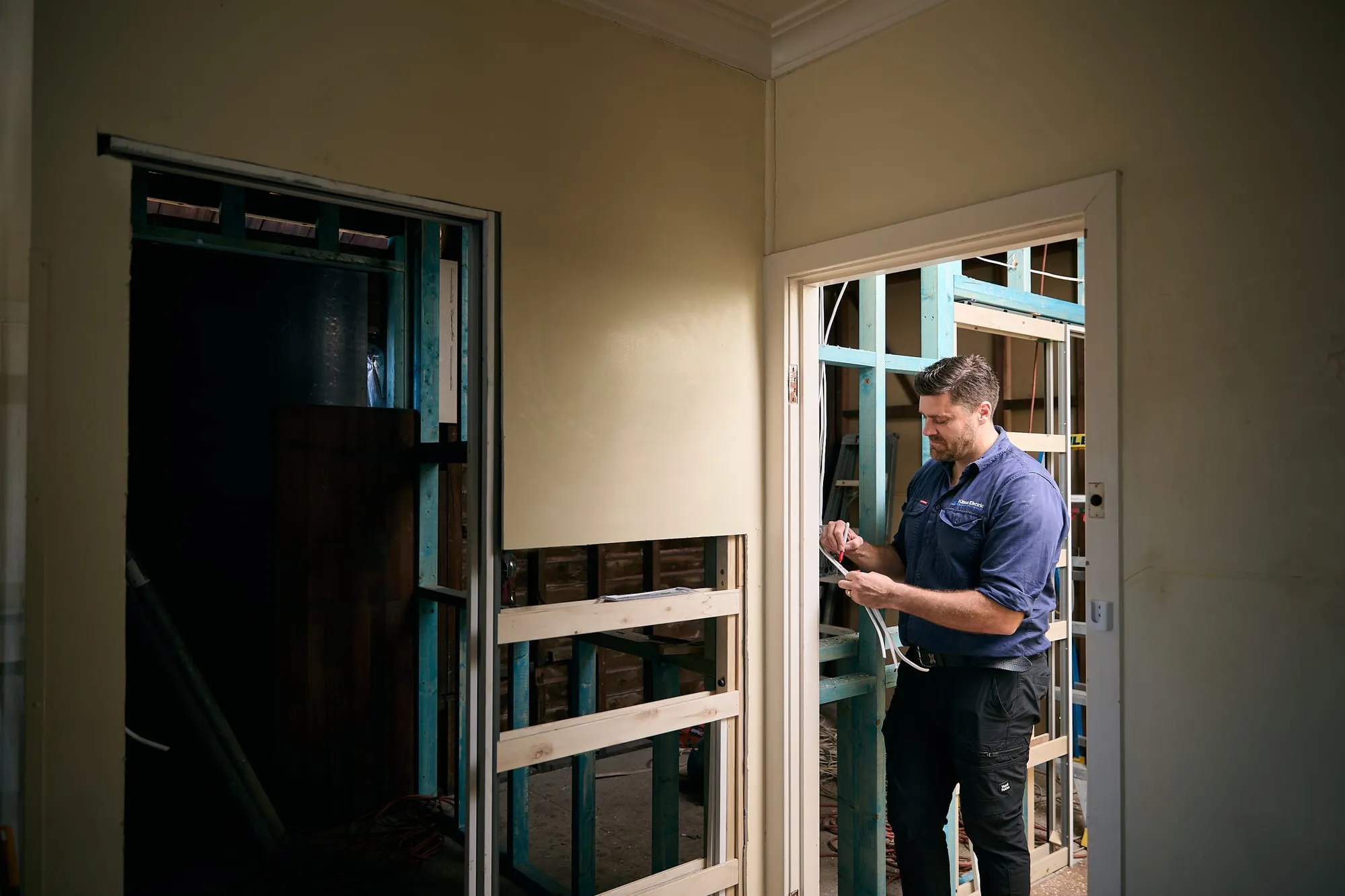 Anthony Kitson wiring a home renovation in Newcastle
