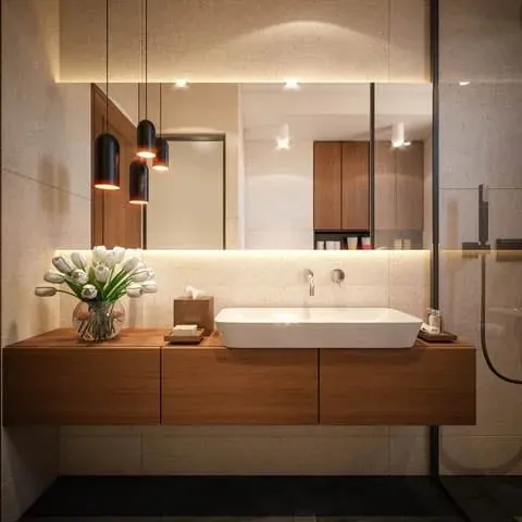 Pendant and vanity lighting in a bathroom