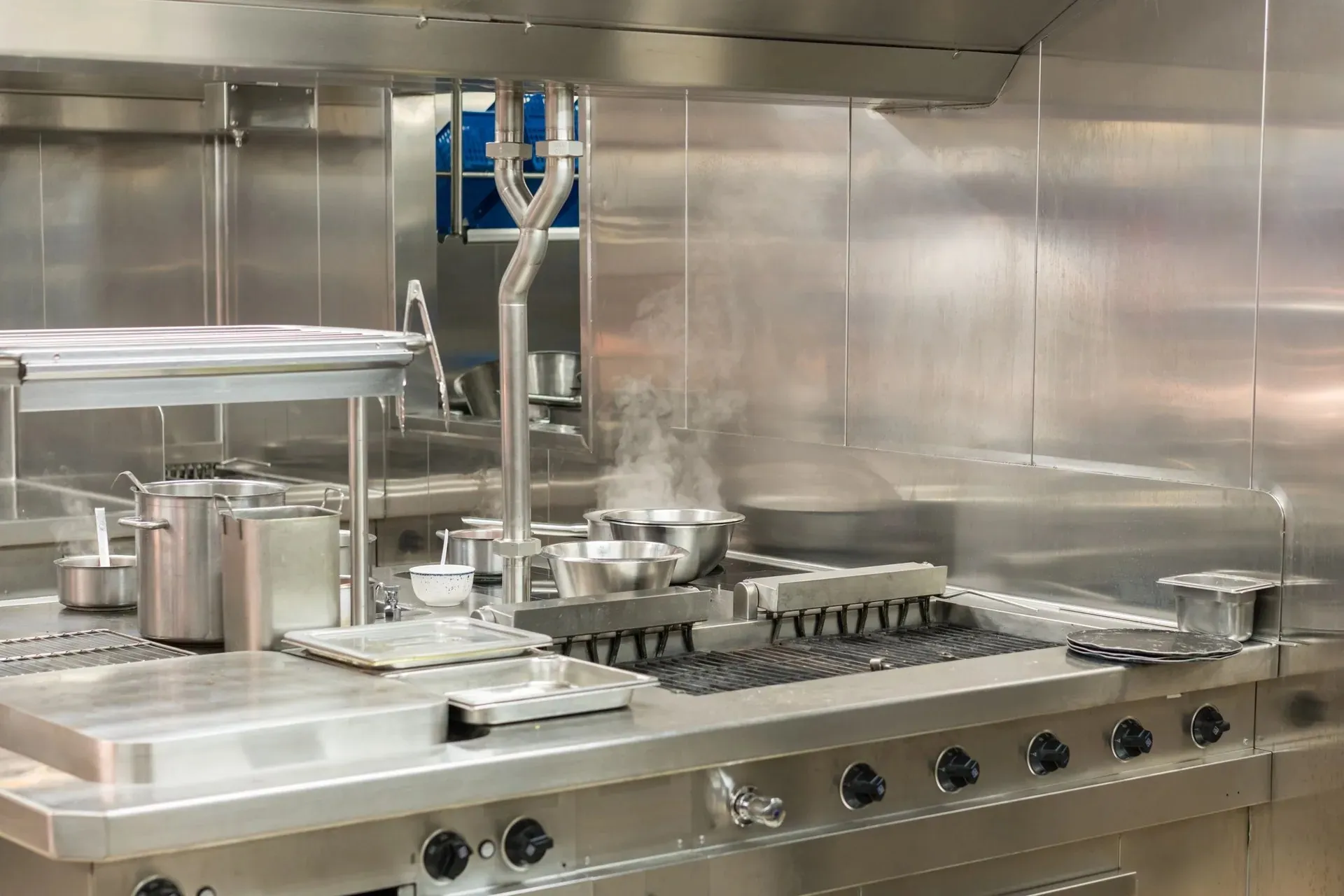 A commercial kitchen cooktop