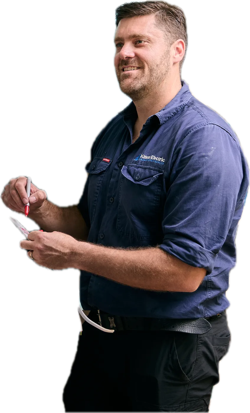 Anthony Kitson marking up a cable on the job