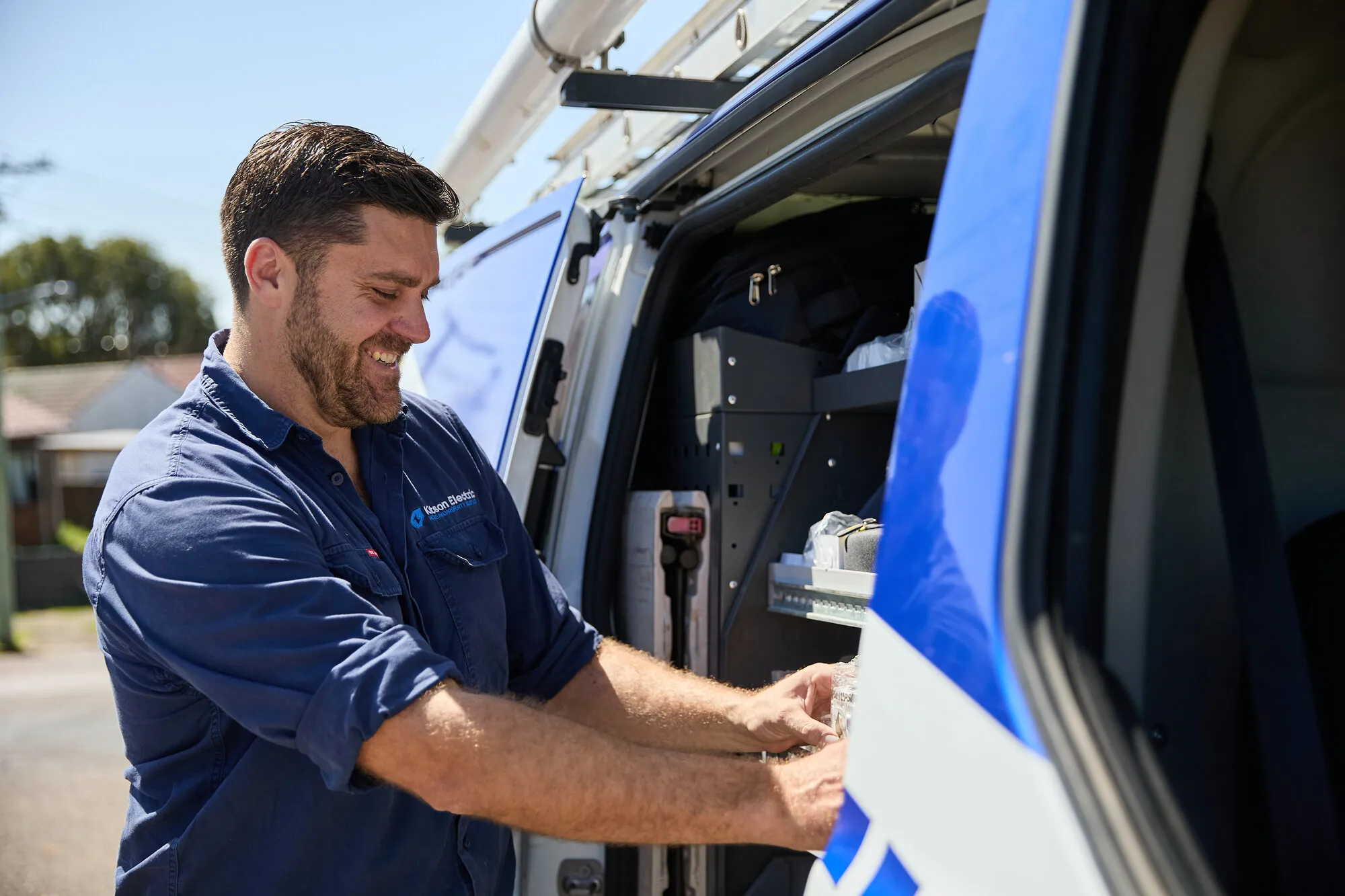 Kitson emergency electrician grabbing gear from the van in Newcastle