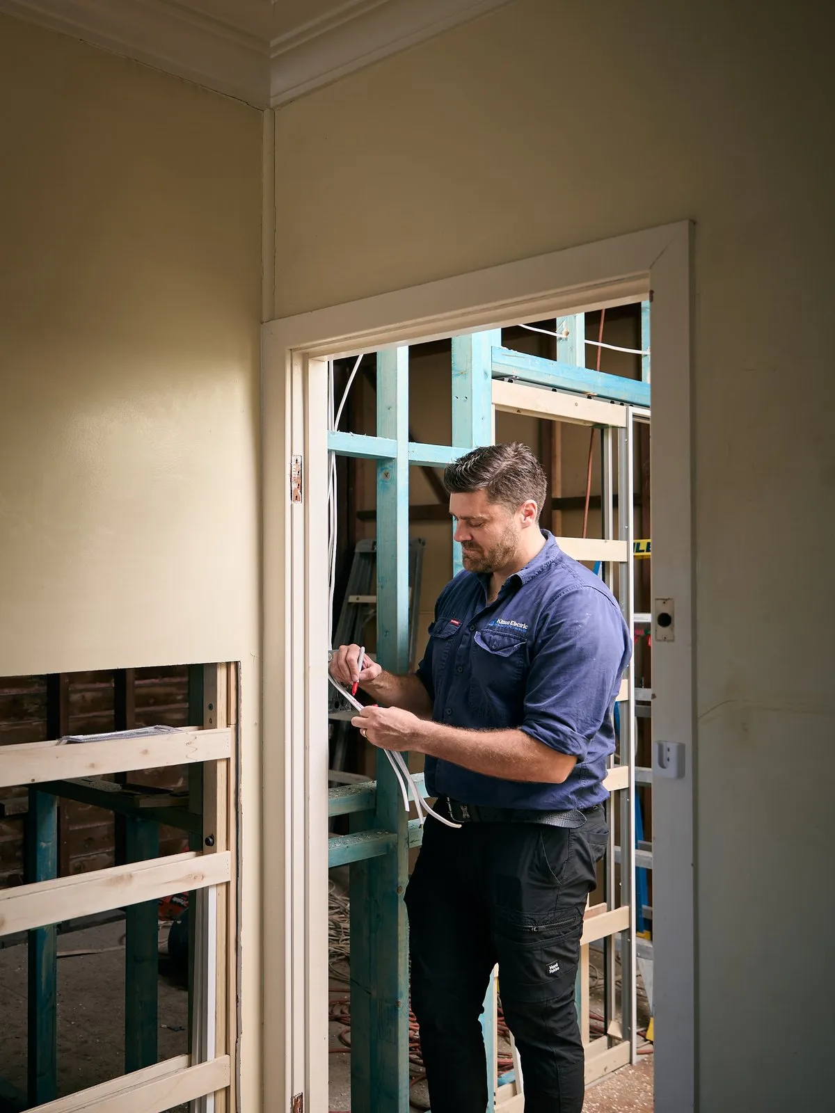 Anthony Kitson wiring a home renovation in Newcastle