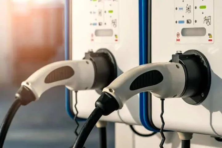 Two commercial EV charging units on a wall