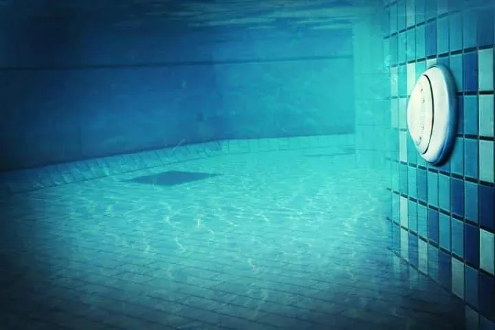 A pool light in the pool wall