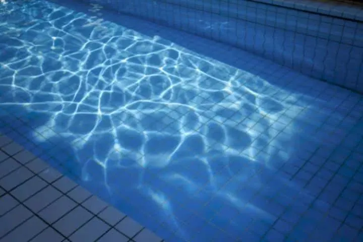 Light rippling on pool water
