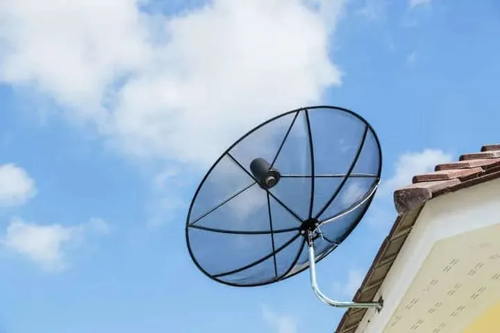 A satellite dish on a roof