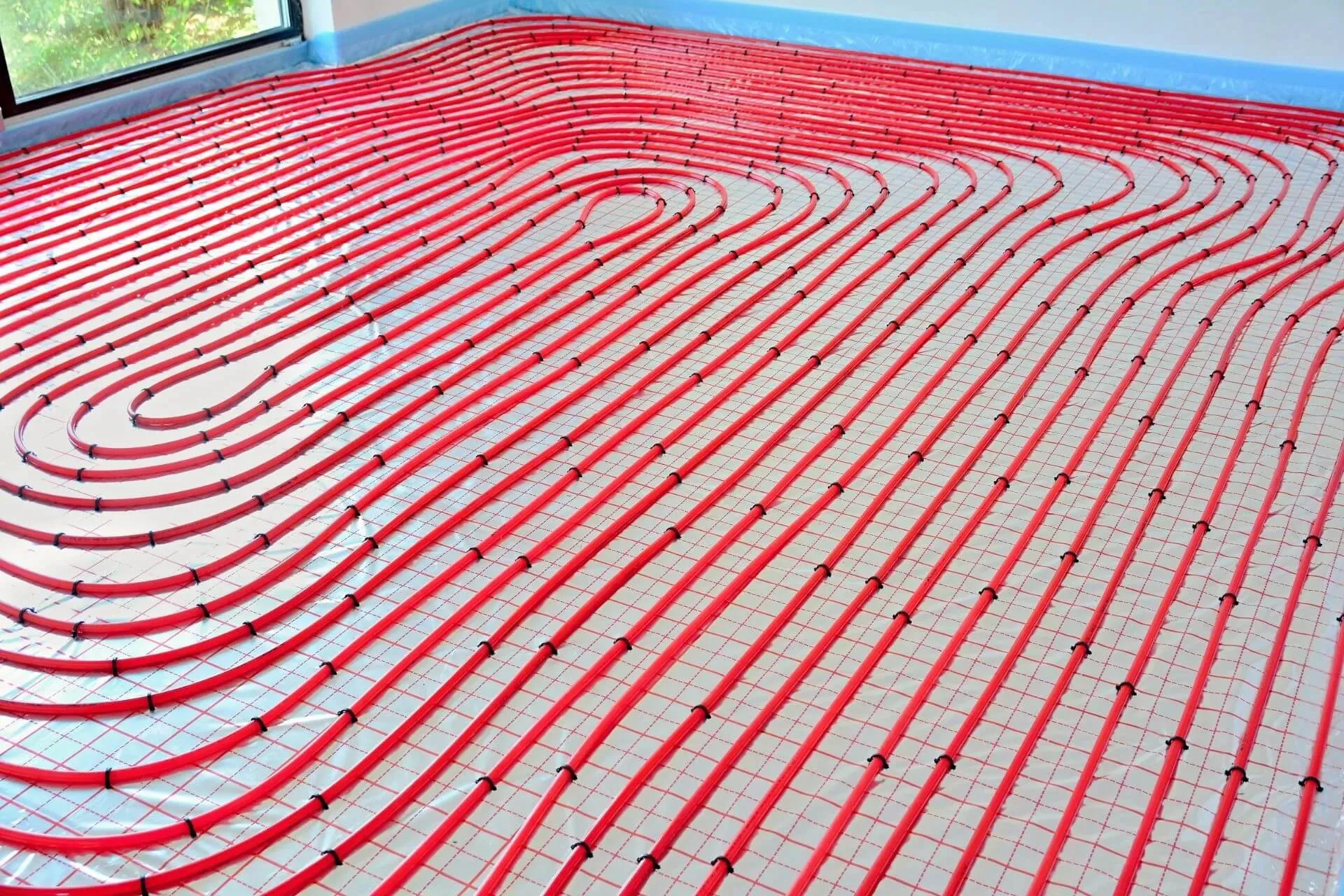 Under floor heating laid in loops before the floor goes down